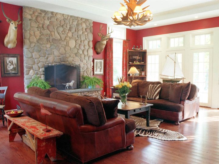 living room with maroon sofa