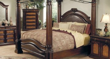 Beautiful wooden canopy bed design in luxurious dark brown bedroom