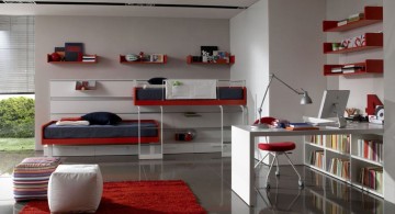 Fancy White Themed Teenage Bedroom With Mounted Red Shelving and Sleek White Desk