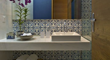 Fantastic modern bathroom interior with floral tiles on the wall