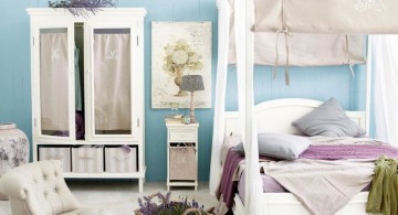 White Wooden Four Poster Canopy Bed With Blue Wall Paint in Modern Bedroom