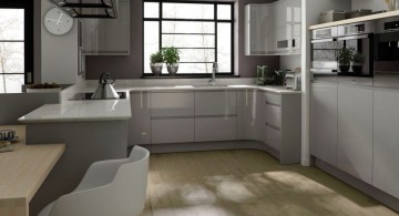 Wonderful grey kitchen inspiration with wooden cabinets and floors