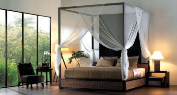 Zen-like master bedroom featuring dark-finished canopy bed sets