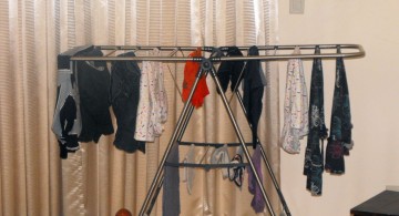 wide laundry room clothes hanger racks designs