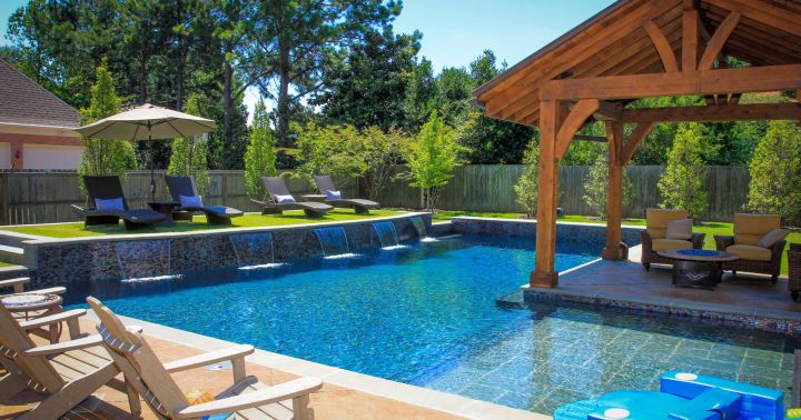 Backyard pool designs with pool island