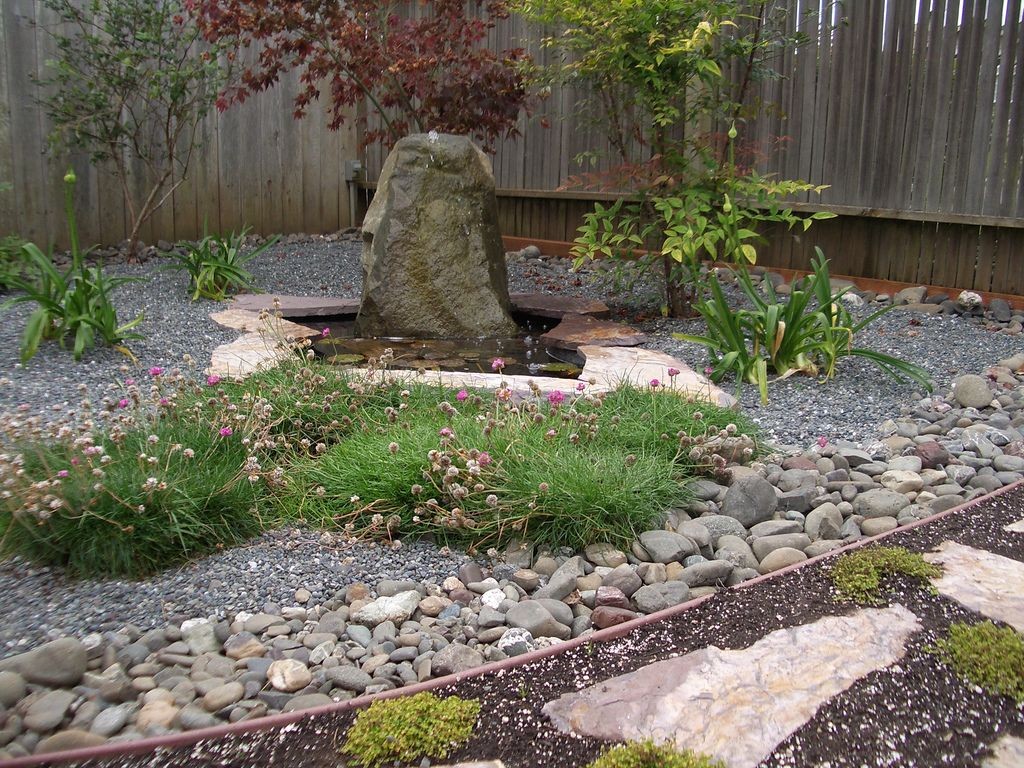 Japanese garden backyard design with big rock