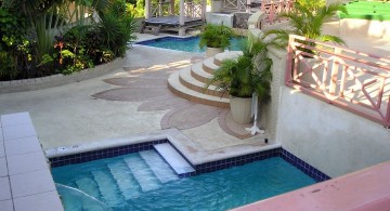 L shaped small pool with tiki hut