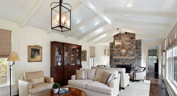 Vaulted ceiling used in large living room with stacked stone fireplace