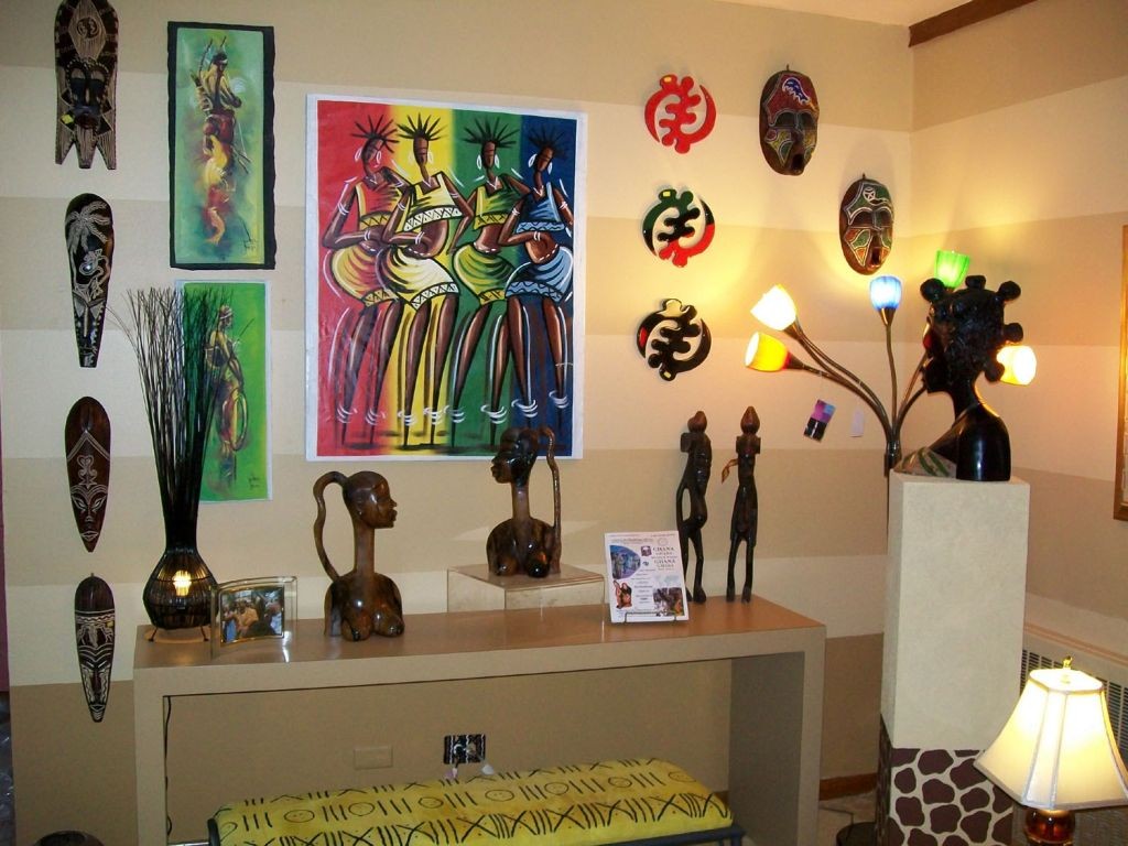 african living room decor with statuettes and masks