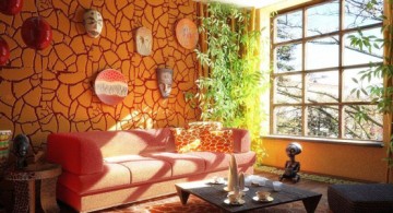 african living room decor with stone wall and hanging masks