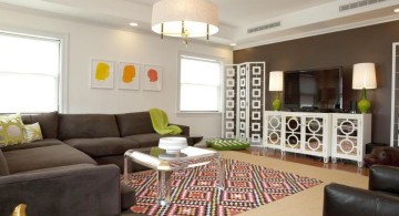 art deco living rooms with geometric print rug and muted grey sofa