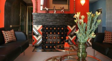 art deco living rooms with red wall and unique tiered glass table