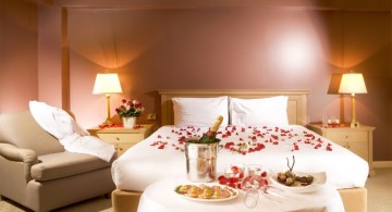 bedroom decoration for valentines day with flowers and champagne