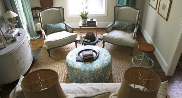 blue and brown living room with Victorian chairs