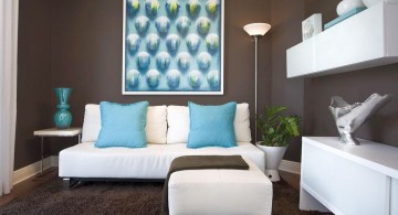 blue and brown living room with white furniture