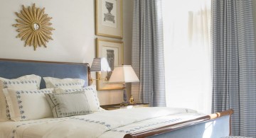 blue and gold bedroom with chandelier for guest bedrooms