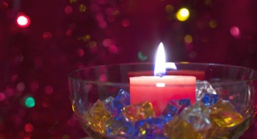 bowl centerpiece ideas with colored crystals and candle