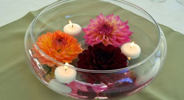 bowl centerpiece ideas with flowers and floating small candles