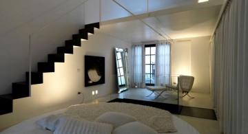 circular bed for minimalist monochromatic apartment
