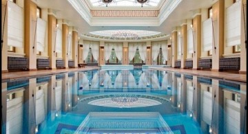 classic indoor swimming pool designs with pillars