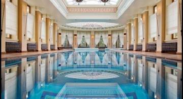 classic indoor swimming pool designs with pillars