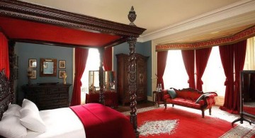 classy red and black bedroom with canopied bed