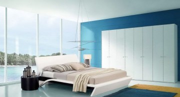 contemporary and minimalist blue and gold bedroom