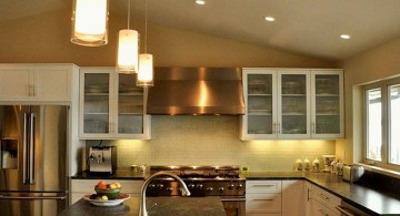 cylindrical mini pendant lights over kitchen island