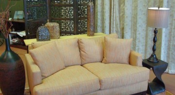 earth tone living room with Asian separator