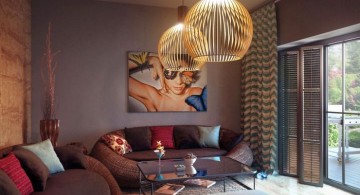 earth tone living room with unique pendant lamp for small spaces