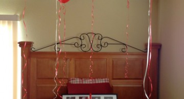 easy DIY bedroom decoration for valentines day with balloons and rose petals