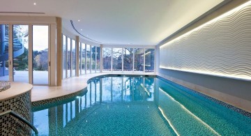 free formed indoor swimming pool with glass doors