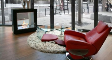 freestanding fireplaces designs with red reclined chair