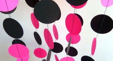 hanging circles pink and black wall decor