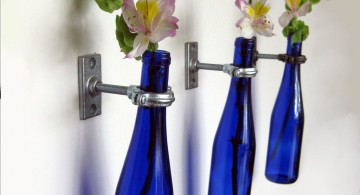 hanging flower vase in cobalt blue bottles