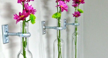 hanging flower vase with old bottles