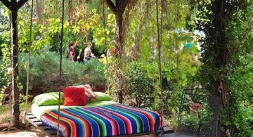 hanging swing bed with colorful bedding