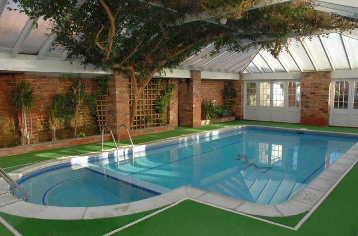 indoor swimming pool with nature theme