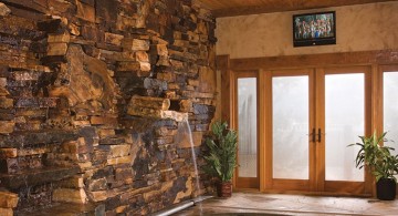 indoor tiny swimming pools with stone wall and wood ceiling