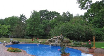 inground nature themed kidney shaped swimming pools