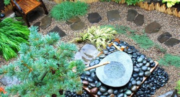 japanese garden designs for small spaces with stone and bamboo fountain