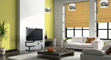 japanese inspired living room with yellow wall and bamboo curtains