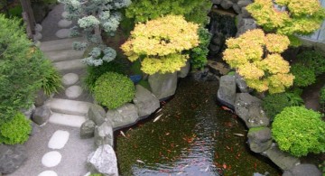 japanese style backyard with small pond and stone pathway