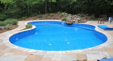 kidney shaped swimming pools with stone deck