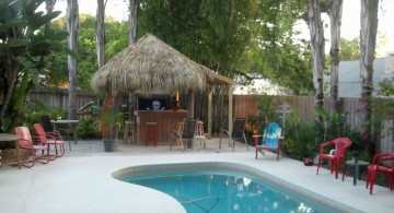 kidney shaped swimming pools with tiki hut