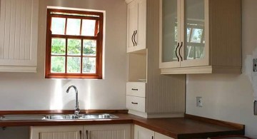 kitchen with pendant lamp and low ceilinged and stand alone kitchen sink