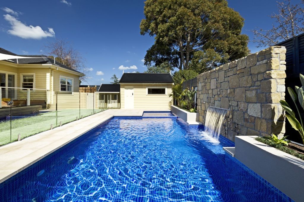 lap pool designs with small waterfalls