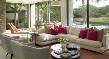 long living room ideas with low coffee table and outlooking the garden