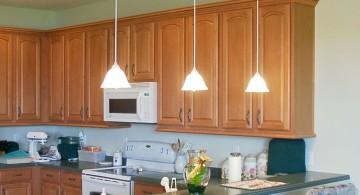 low hanging mini pendant lights over kitchen island for an apartment