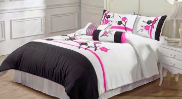 minimalist pink and black bedroom decor in plain white room